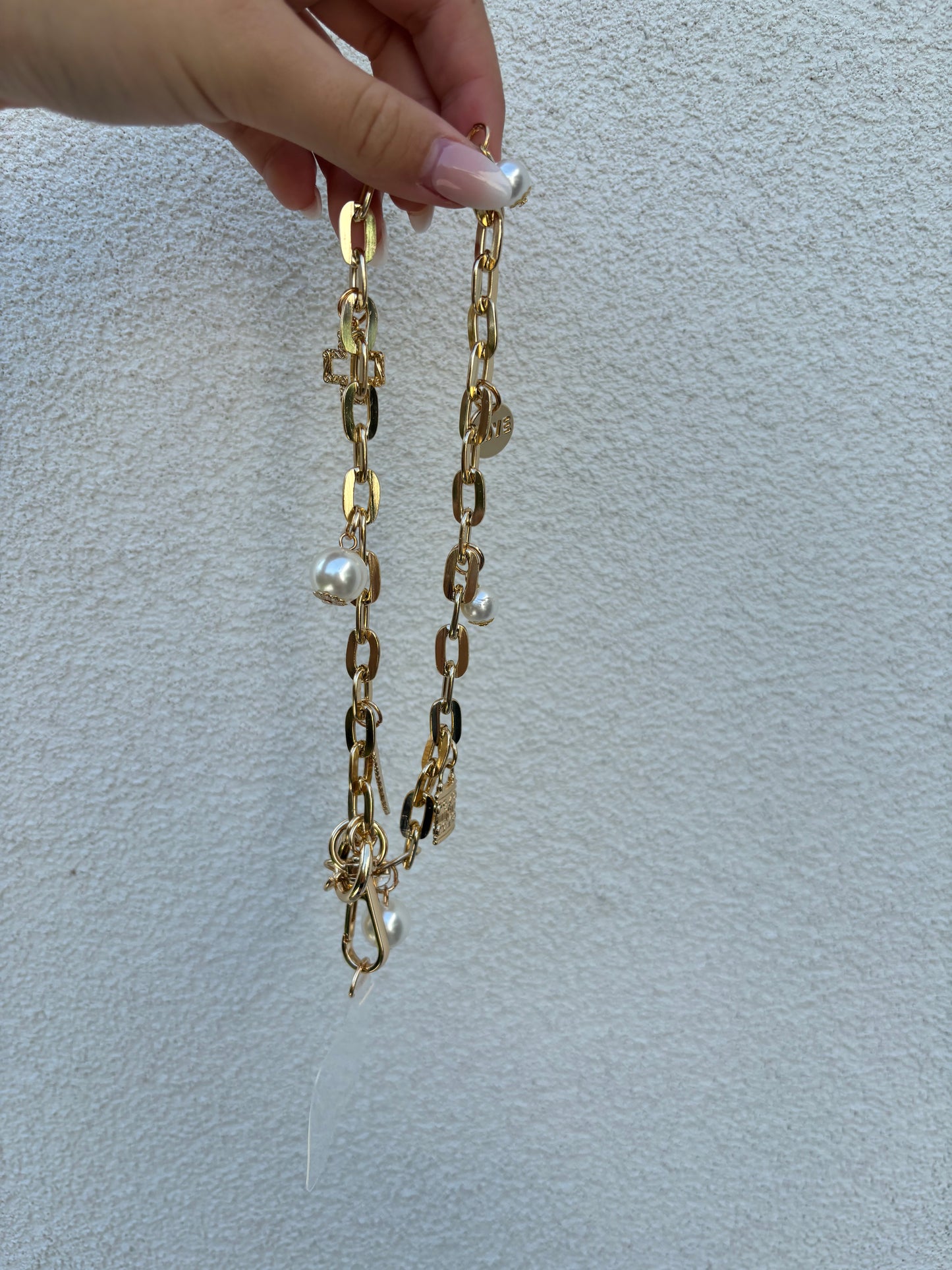 Phonecord gold with charms