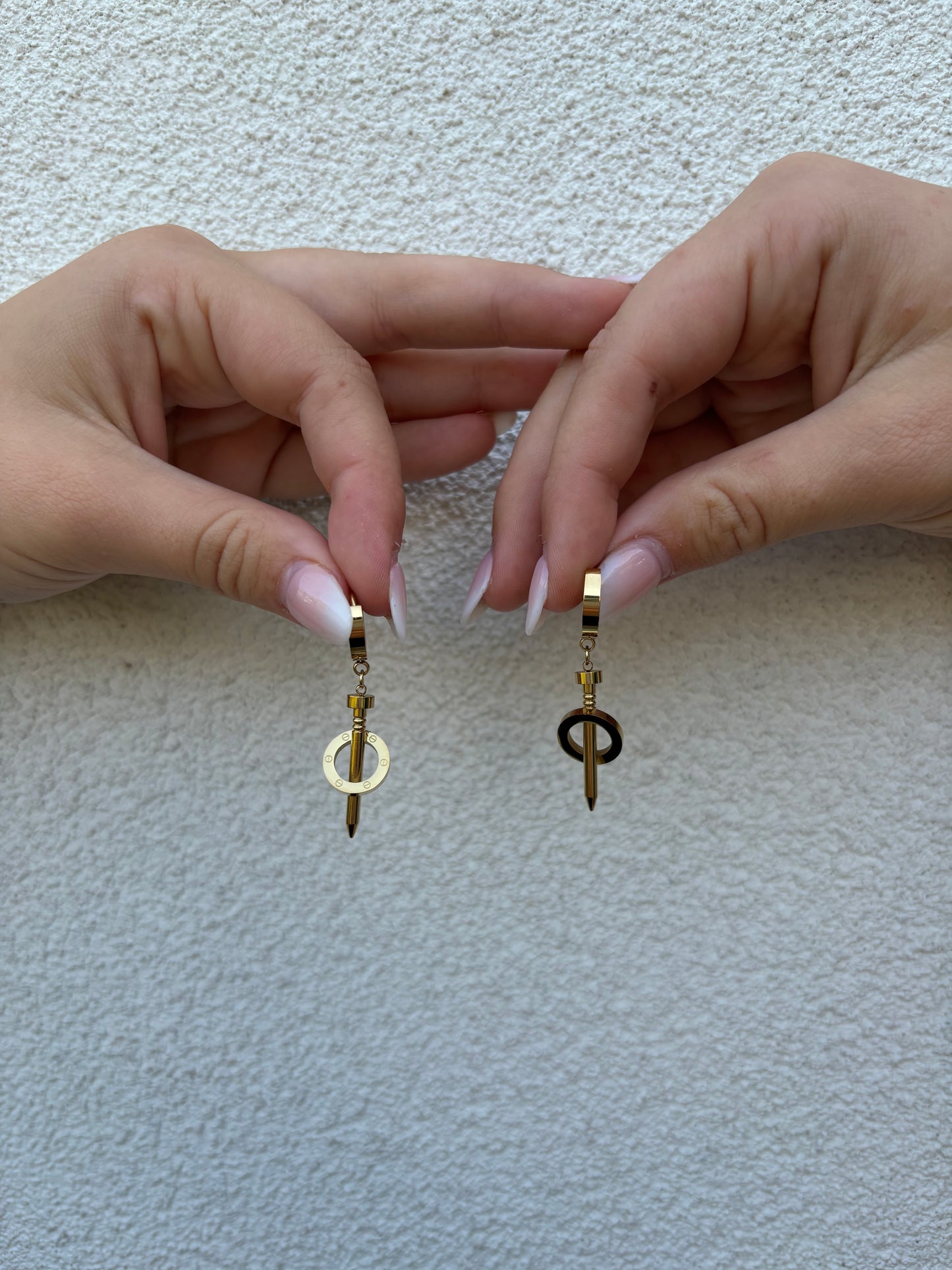 Nail earrings