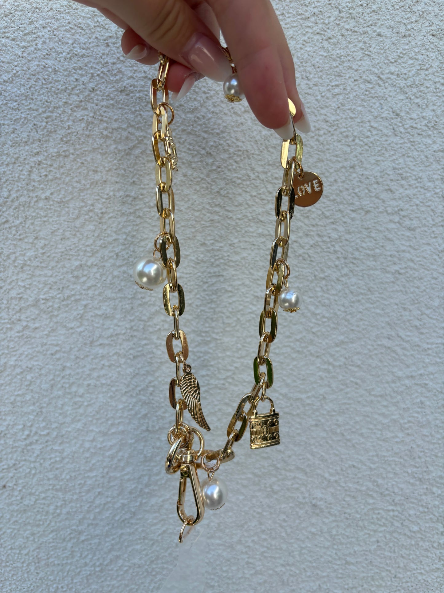 Phonecord gold with charms